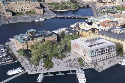 Flygbild på Blaiseholmen, med byggnad inritad bakom Nationalmuseum. Byggnaden kan liknas vid en kloss med många små fönster.